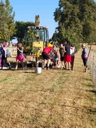 Youth planting tree at Wahoo Sunrise Cemetery